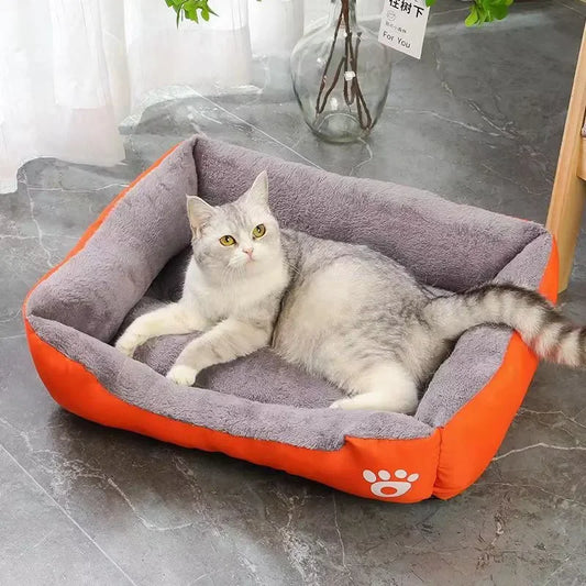 Orange rectangular Pet Bed made from plush comfortable padded material. Grey in colour with Nylon Orange durable outer with non-slip base